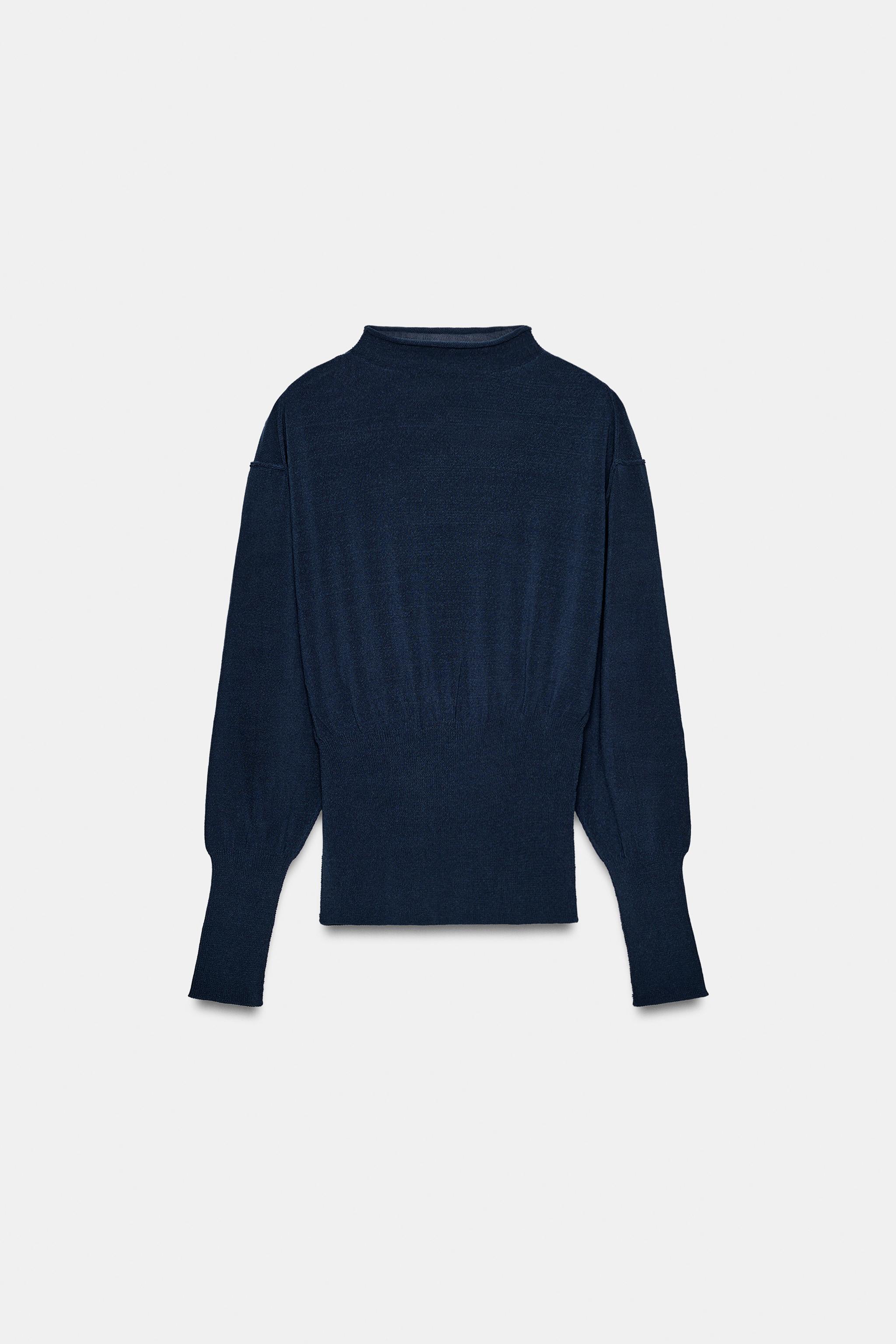 PULL EN MAILLE AVEC TAILLE LARGE